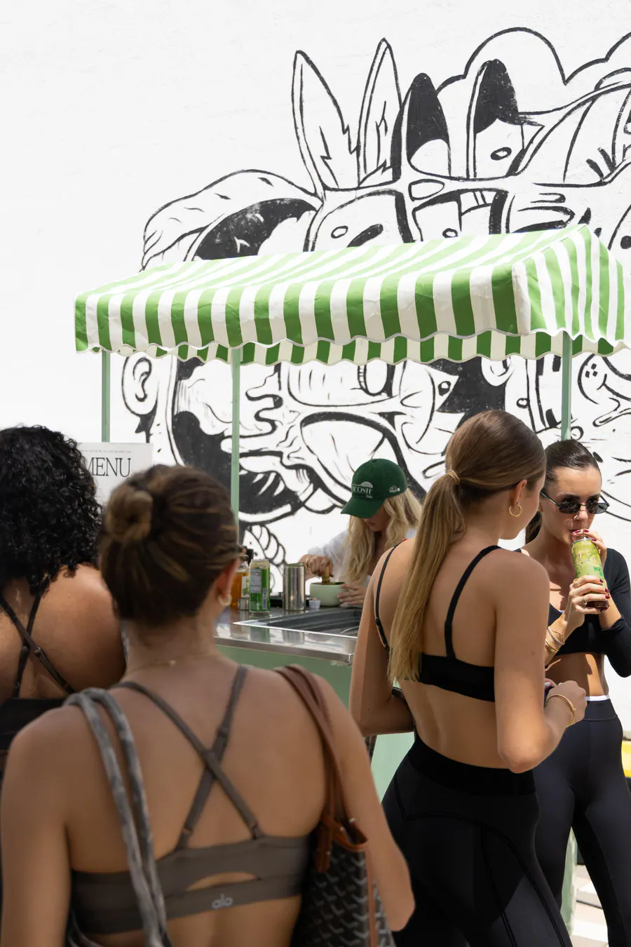 A crowd gathered around The Matcha Bike